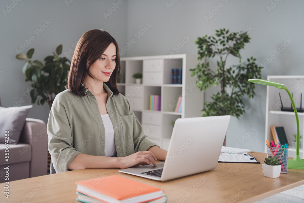 Portrait of smart recruiter lady use wireless netbook coworking write email modern office indoors