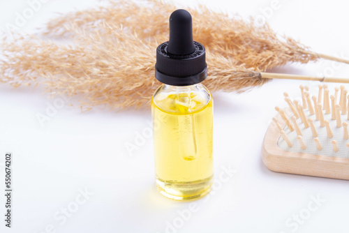 Oil for hair growth. Therapeutic oil to activate hair growth. Beauty and health.