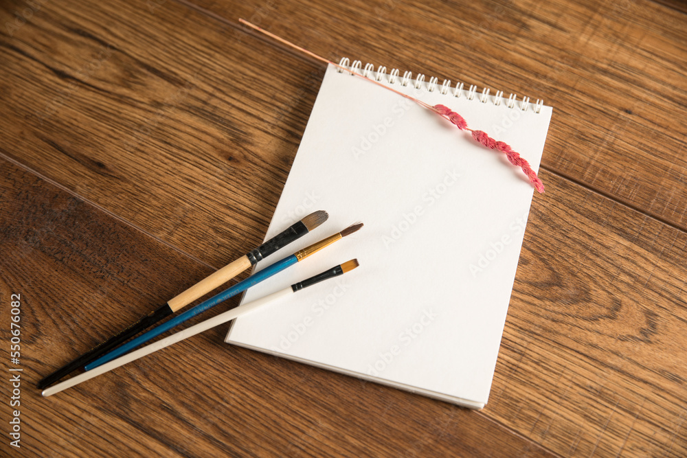 Notepad with brushes Notepad with brushes