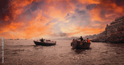 People on boat at Varanasi evening beautiful image of varanasi indian place of shiva photo