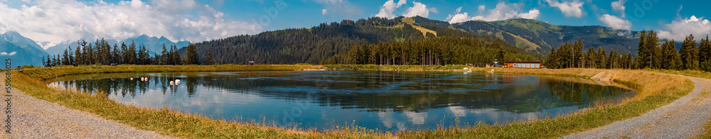 High resolution stitched panorama with reflections at the famous Schmittenhoehe summit, Zell am See, Salzburg, Austria