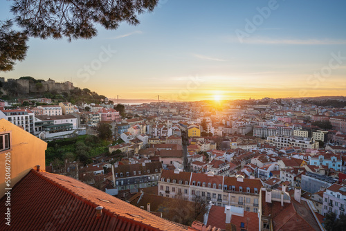 Aerial view of Lisbon at sunset from Miradouro da Graca Viewpoint - Lisbon, Portugal photo