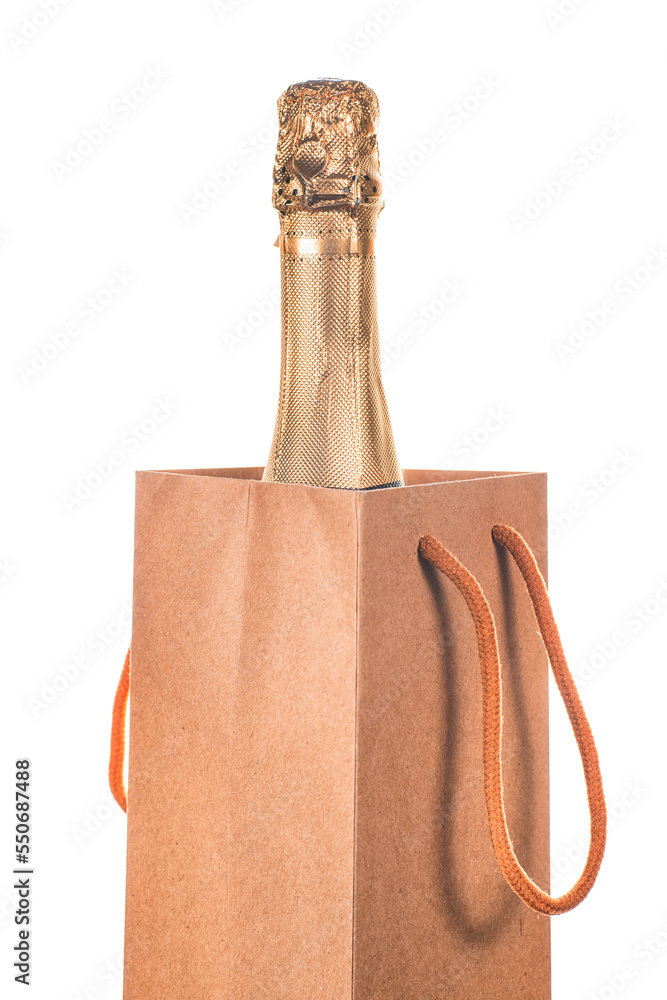 Champagne bottle into craft paper gift bag. Png isolated with transparency