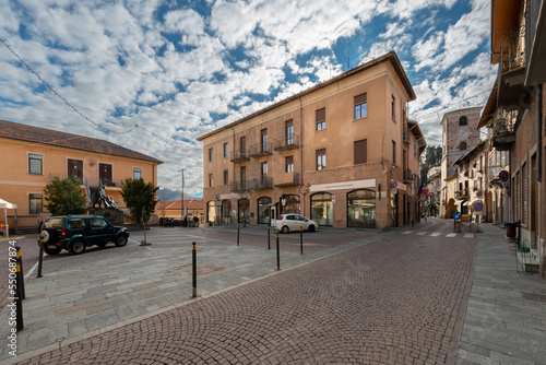 Borgo San Dalmazzo, Cuneo, Italy - December 01, 2022: Via Roma with Town Hall and Civic Tower, built in the 16th century in the city of the cold fair © framarzo