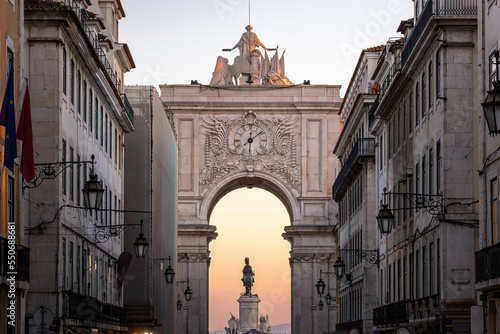 Rua Augusta Arch at sunset with King Dom Jose I Statue on background - Lisbon, Portugal
