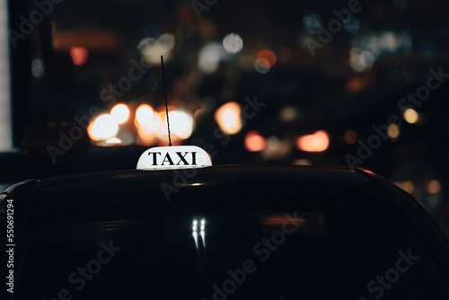 Fototapet Car with taxi sign
