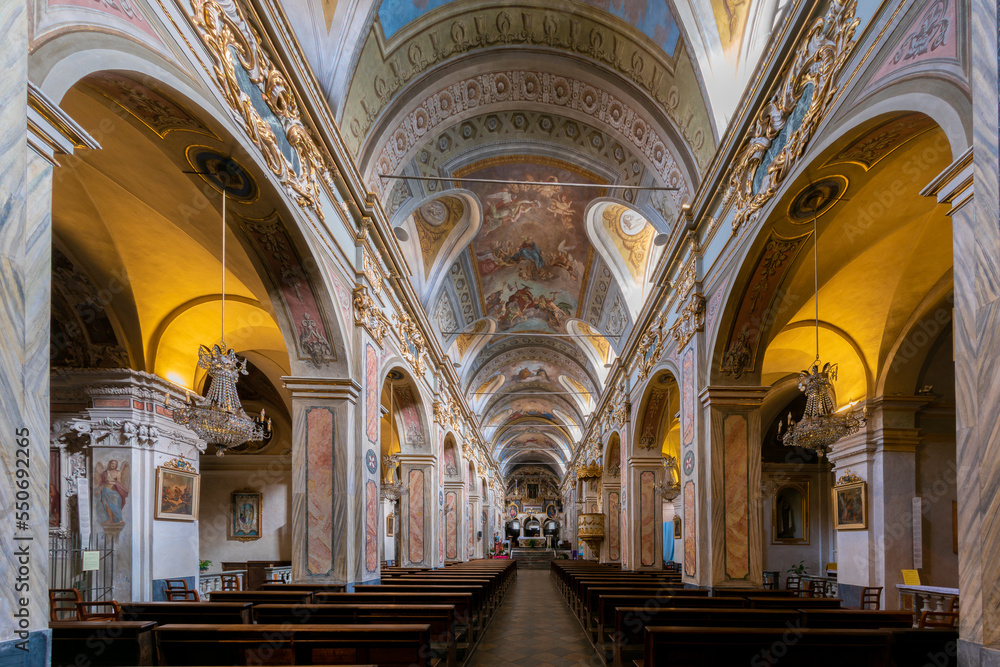Borgo San Dalamazzo, Cuneo, Italy- December 01, 2022: interior with frescoed vaults of parish church of ancient abbey of San Dalmazzo di Pedona in the town of national snail fair