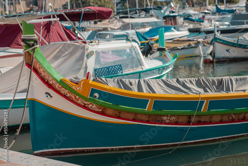 Wallpaper Mural Luzzu, a typical boat of Malta moored in the marina of Valletta Torontodigital.ca