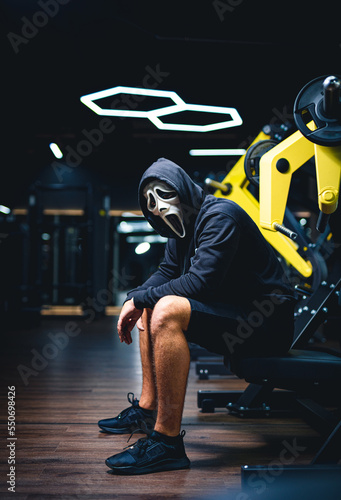 Horror dark gym workout. cary training in gym.