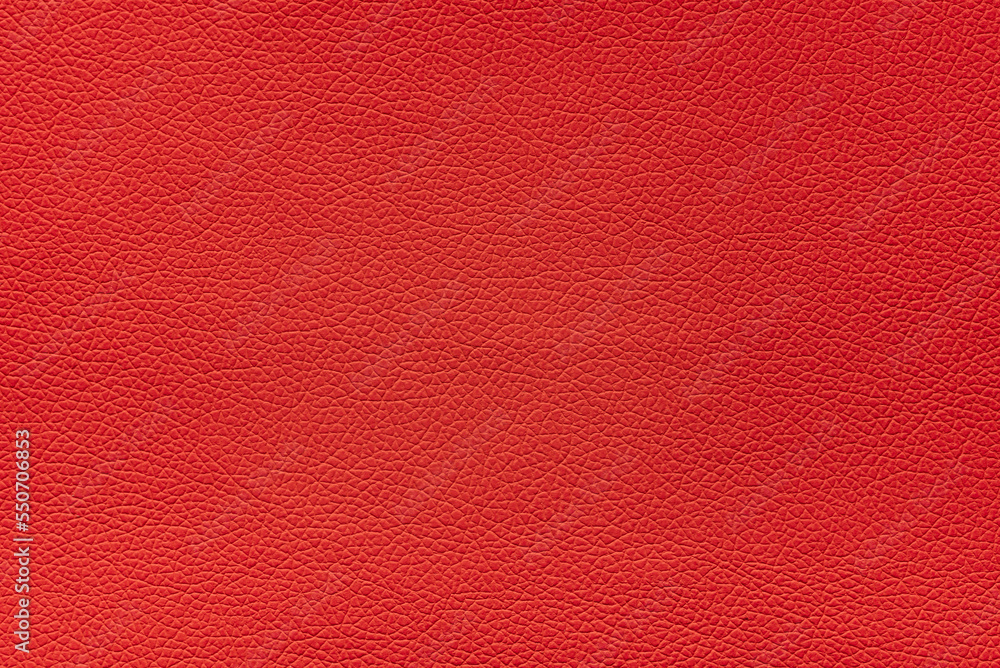 Fototapeta premium Texture of artificial leather scarlet color, background.