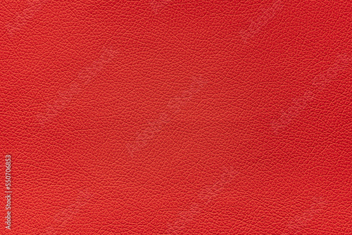 Texture of artificial leather scarlet color, background.