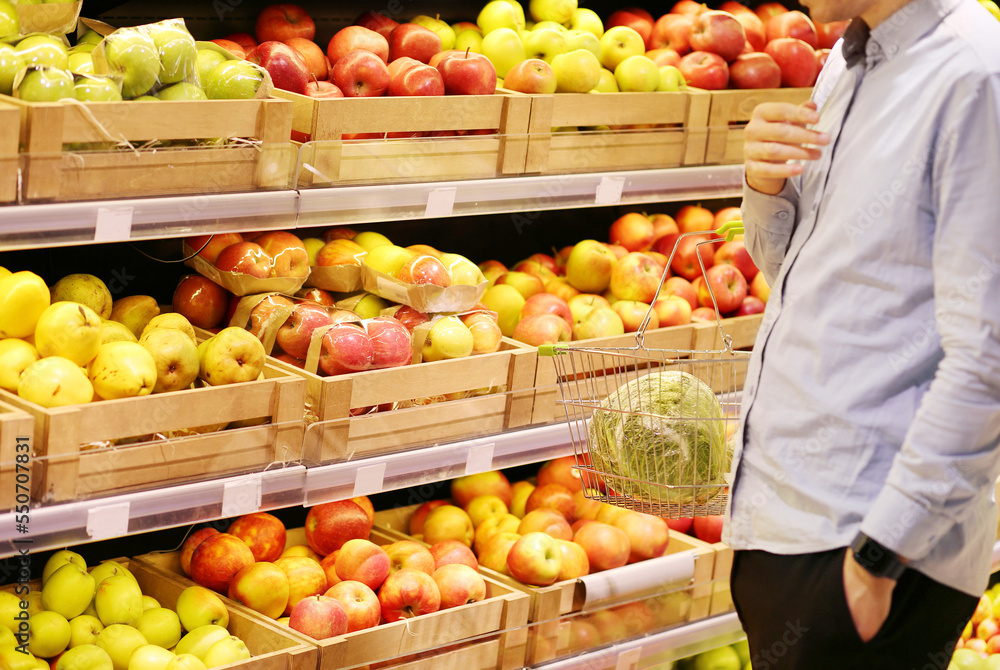 Man buying fruits at the market