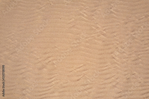 Wind wave vortices in sand background from aerial top view