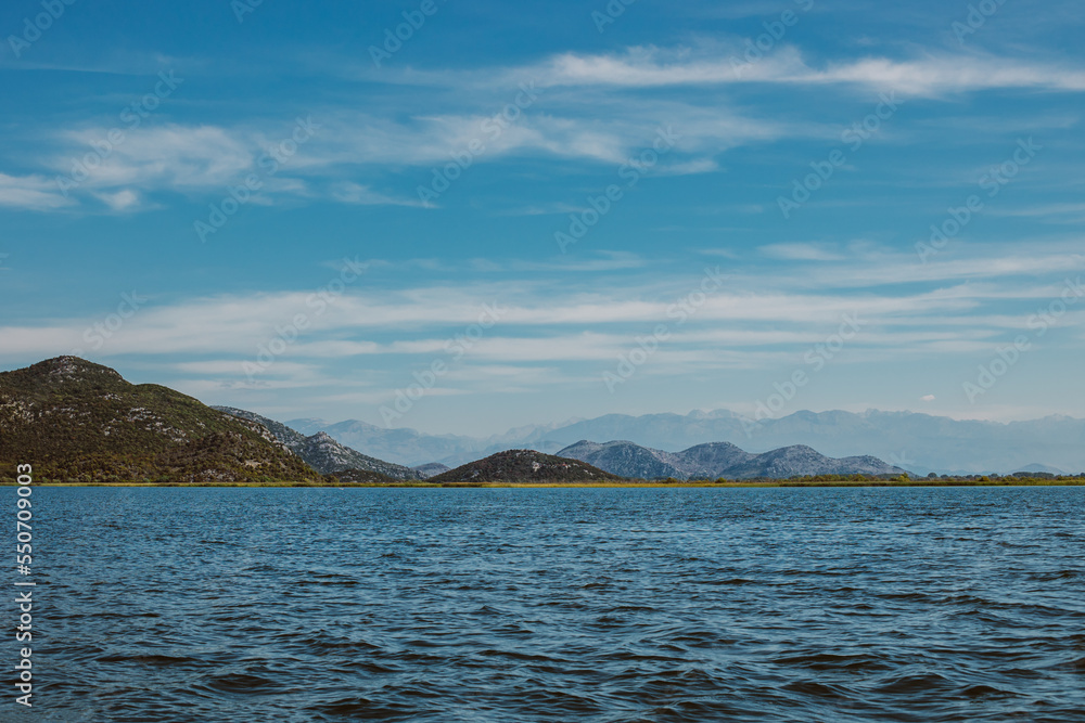 Amazing view of Skadar Lake and beautiful mountains on a sunny morning.