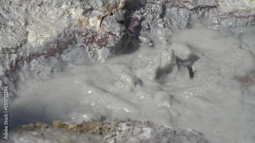 Semi-thermal area, geothermal fluid. Mineral hot springs is confined to post-volcanic phase, white ammonium chloride. Kamchatka photo