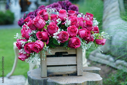 Beautiful colorful roses on the table for the festive New Year 2023