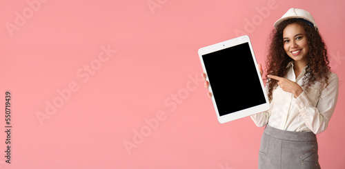 Young female designer with ...