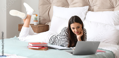 Female student with books a...