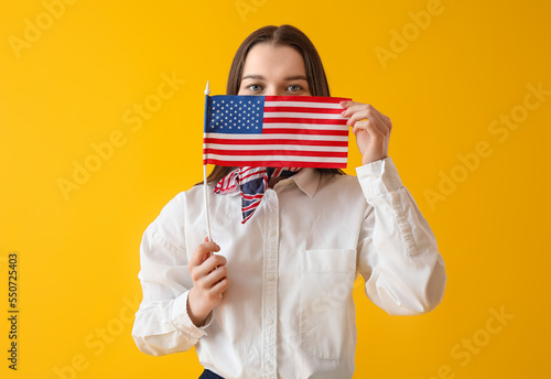 Young woman with USA flag o...