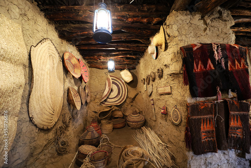 old traditional crafts in old arab mud house interior- Al Malad heritage Museum - Al Baha , Saudi Arabia photo