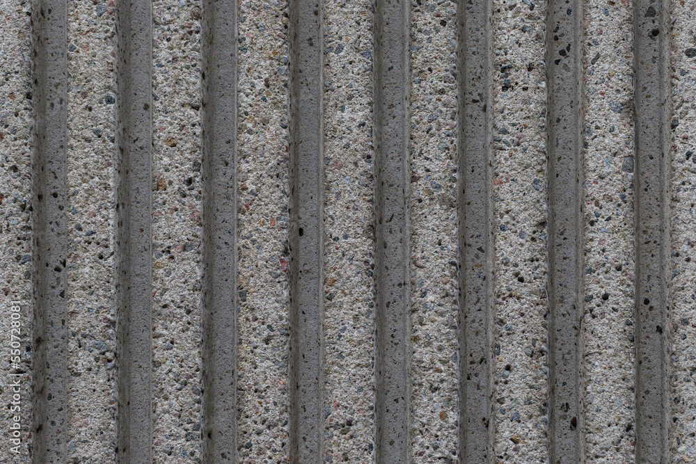 Grey textured striped stone wall background, full frame Grey textured striped stone wall background, full frame