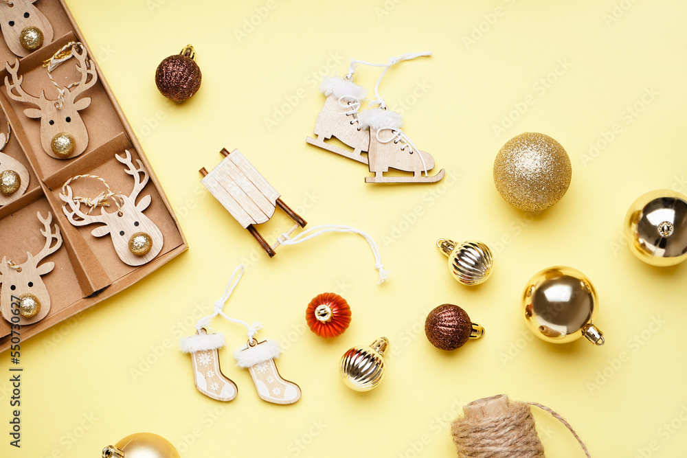 Beautiful Christmas toys on yellow background Beautiful Christmas toys on yellow background