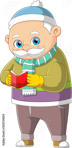 A old man reading book in winter season