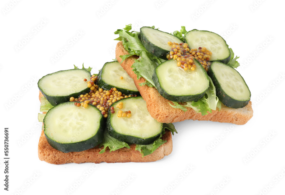 Tasty cucumber sandwiches with arugula and mustard on white background Tasty cucumber sandwiches with arugula and mustard on white background