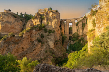 Canvas schilderij Ronda Puente Nuevo Ronda bij zonsondergang in Andalusië  © Patrick