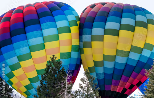 Hot air balloons gently touching