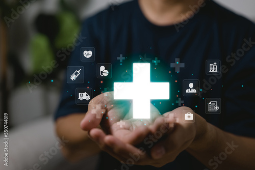 Wallpaper Mural The healthcare medical icon is represented by a man holding a plus sign. A health concept is health insurance. access to welfare, health, and copy space Torontodigital.ca