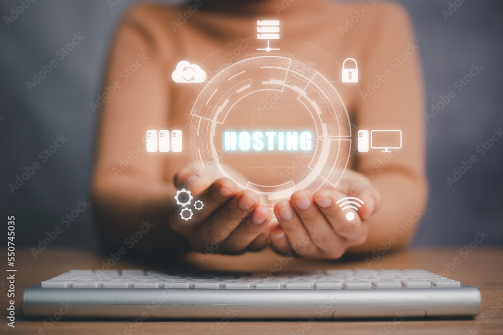 Wall Mural Web hosting concept, Woman hand holding on the virtual screen inscription Hosting on desk, Internet, business, Technology and network concept