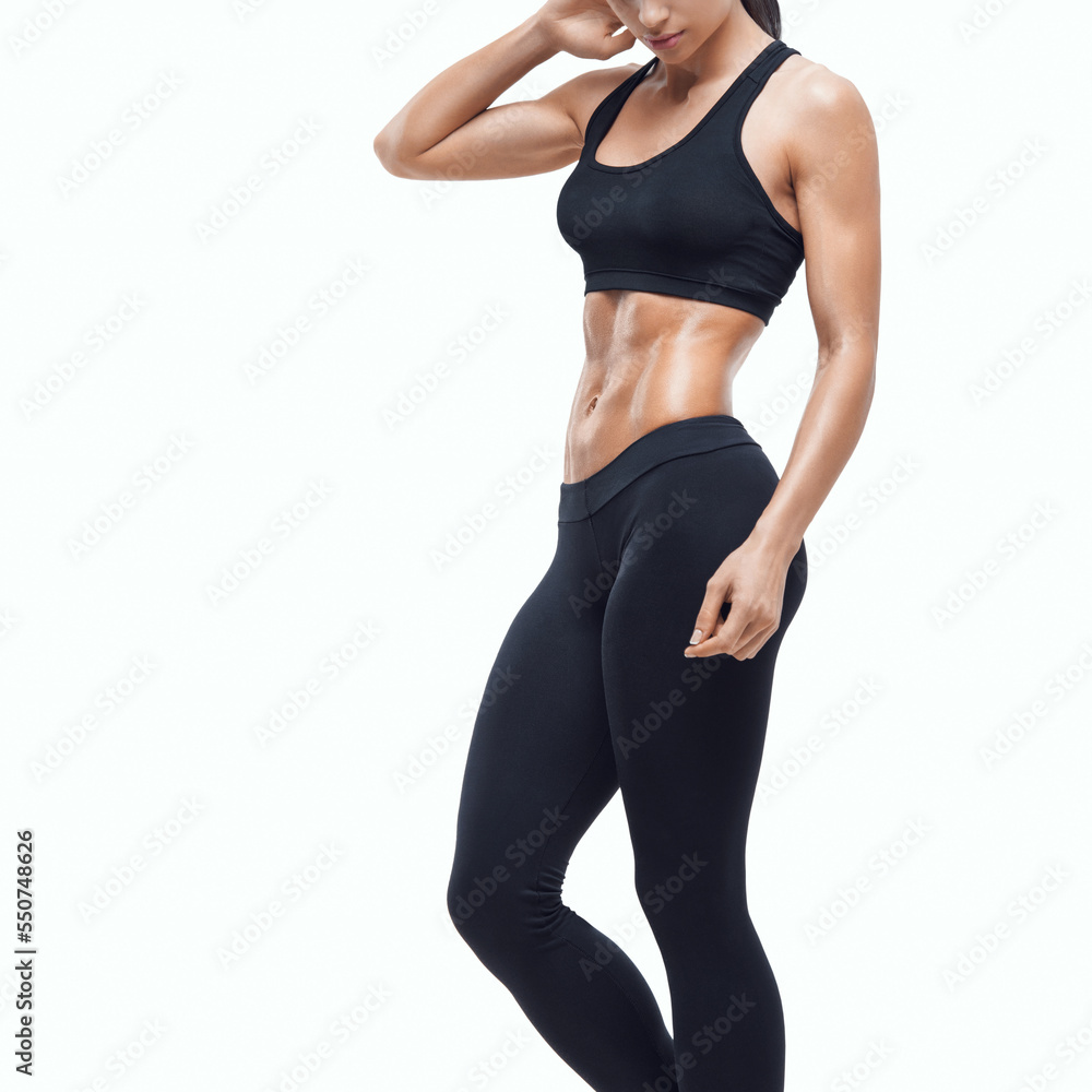 Fitness sporty woman showing her well trained body Fitness sporty woman showing her well trained body