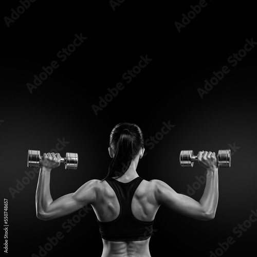 Fitness woman in training muscles of the back with dumbbells