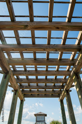 Destin, Florida- View of a wooden outdoor roof grid under the clear sky