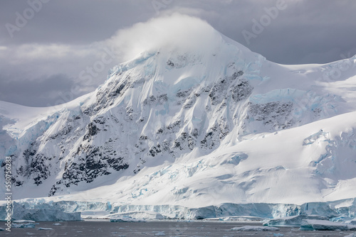 A mountain in Antarctica covered in snow on a bright summer day © Rob Schultz