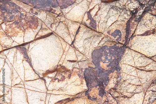 Natural rock texture abstract cracked brown background