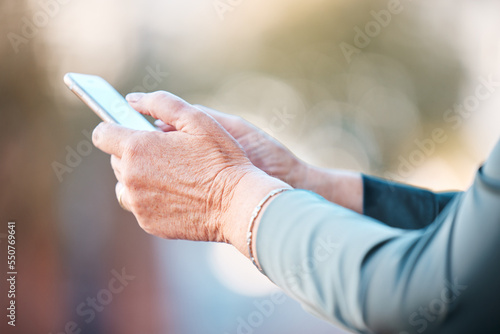 Phone, app and hands of retirement woman typing on screen for email, ecommerce or social media. Communication, internet and mobile application of senior person online with 5g connectivity.