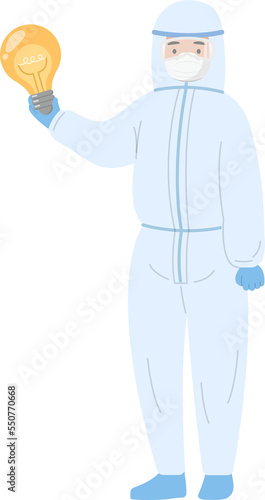 Medical staff or doctor or nurse wearing isolation gown holding light bulb