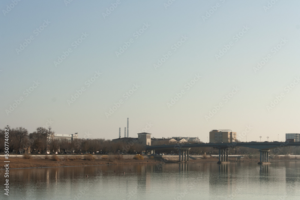 bridge over the river in a modern Central Asian city
