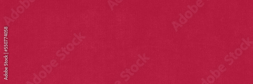 Textured background trendy color of 2023 year Viva Magenta
