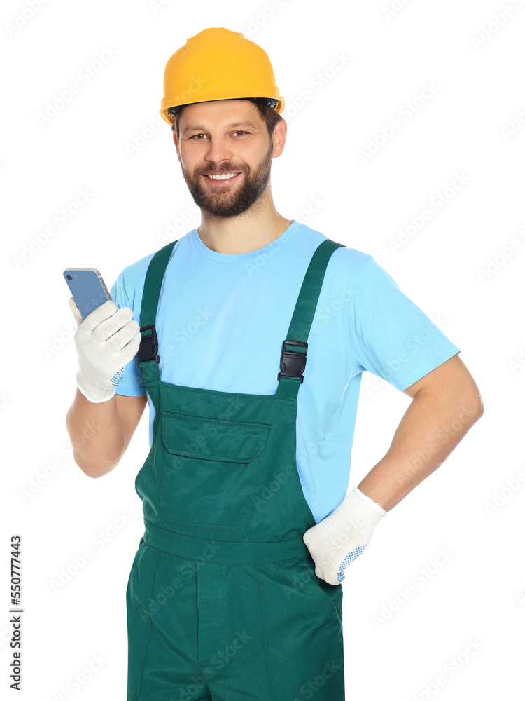 Professional repairman in uniform with smartphone on white background Professional repairman in uniform with smartphone on white background