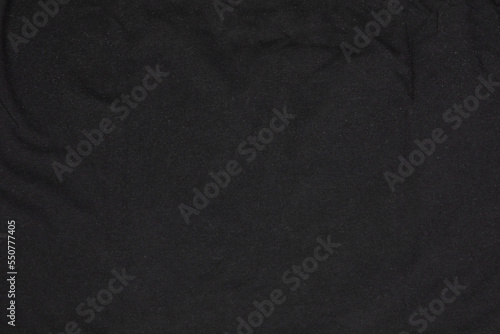 Black dark canvas fabric cotton background with folds copy space