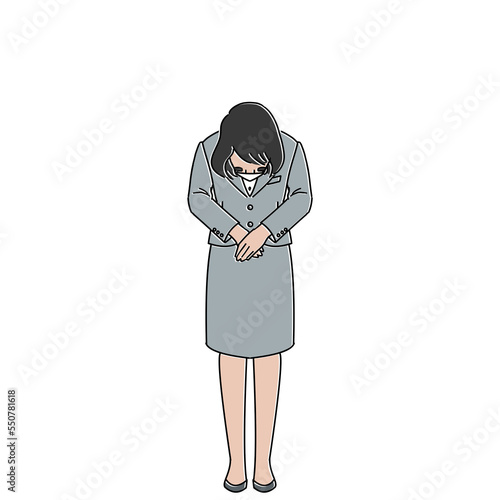 お辞儀をするスーツを着た女性　マスクあり