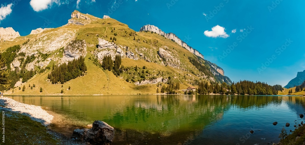 High resolution stitched panorama with reflections at the famous Seealpsee lake, Appenzell, Alpstein, Switzerland
