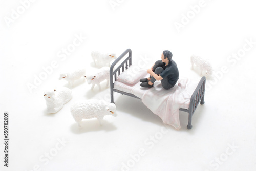 a mini figure, the Sleepless counting sheep photo