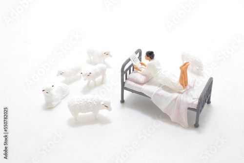 a mini figure, the Sleepless counting sheep