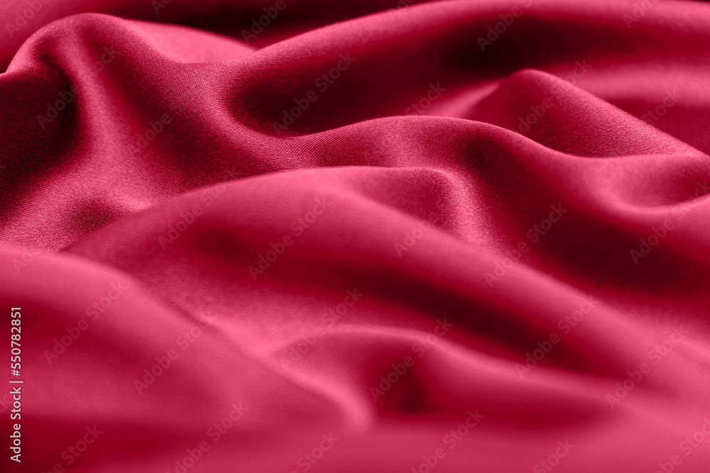 Obraz premium Purple fabric background in color Viva Magenta.Demonstrating the colors of 2023.