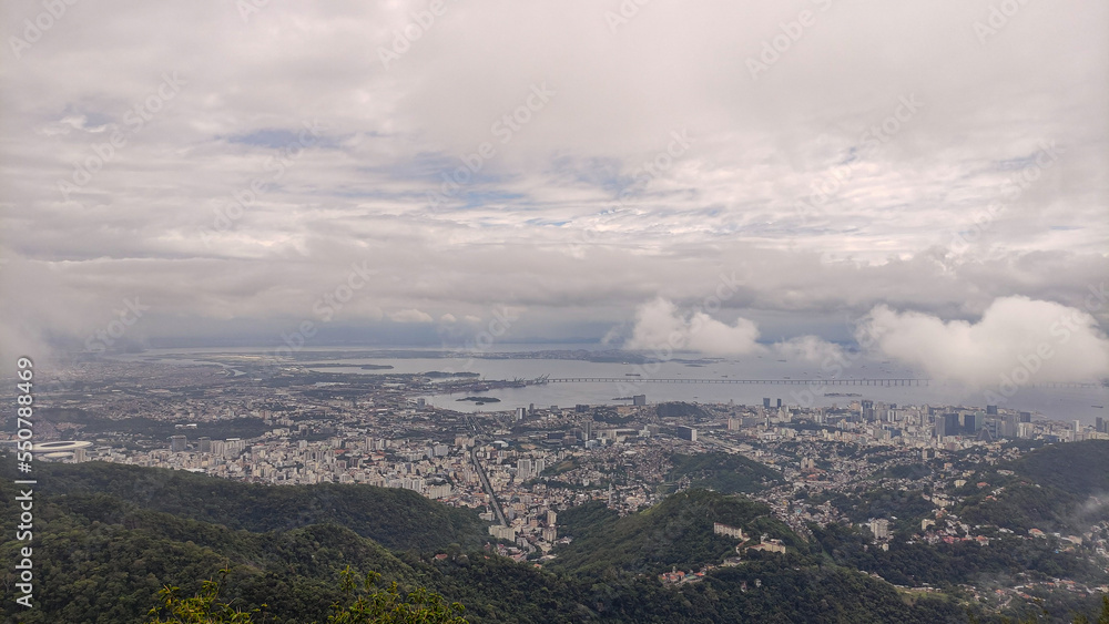 An aerial view of Rio de Janeiro shrouded in fog. Seen from the helipad area of Mirante Dona Marta, Rio de Janeiro, Brazil
An aerial view of Rio de Janeiro shrouded in fog. Seen from the helipad area of Mirante Dona Marta, Rio de Janeiro, Brazil