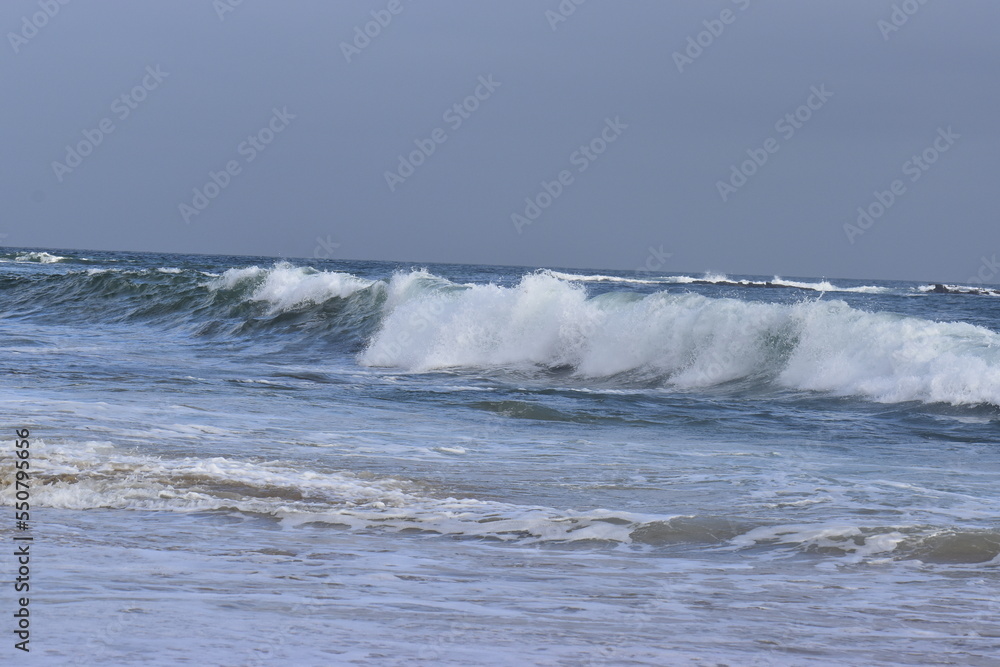 wave breaking on the beach